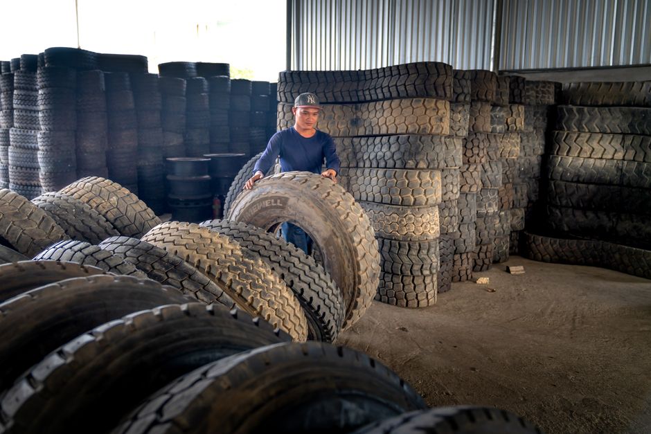 Warehouse shelving unit filled with securely stored tires